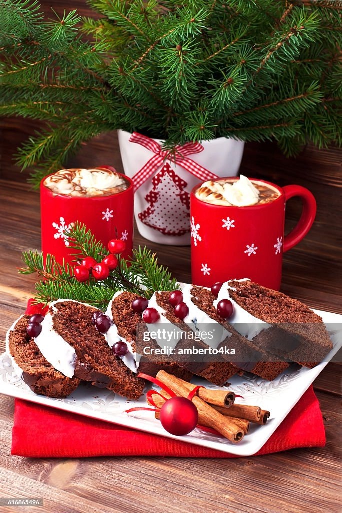 Tasty cake with hot chocolate drink