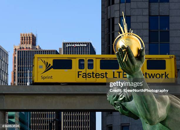 downtown detroit michigan street scene - detroit people mover stock pictures, royalty-free photos & images