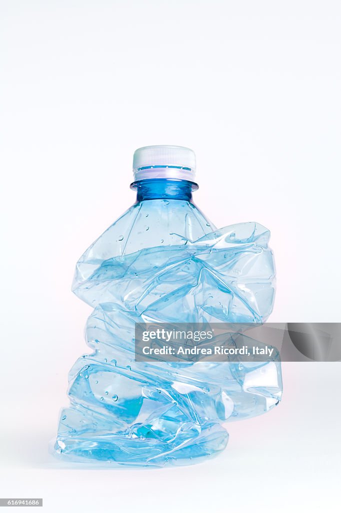Crushed plastic bottle to recycle