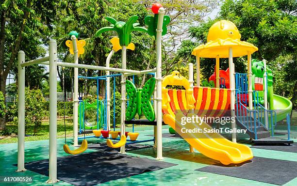 children playground - speeltuintoestellen stockfoto's en -beelden