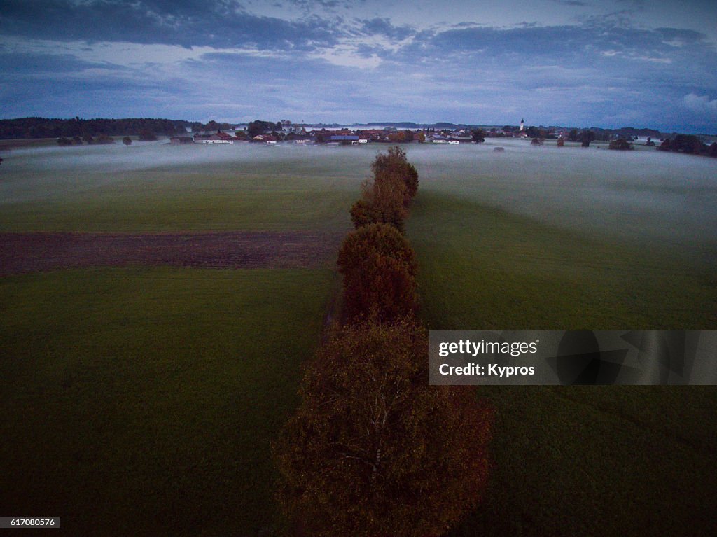 Europe, Germany, Bavaria, Aerial View Of Misty Farmland