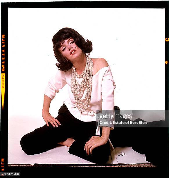 American actress Marilyn Monroe wearing a black wig, Beverly Hills, California, July 1962. The two sessions for the photoshoot took place in late...