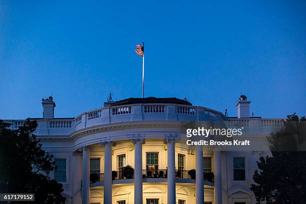 The south facade of the White House at dusk, including the Truman Balcony, October 3, 2016 in Washington, DC.