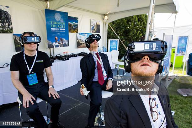 Visitors experience 'Through the Ages', during the 'South By South Lawn', SXSL festival on October 3, 2016 at the White House in Washington, DC. This...