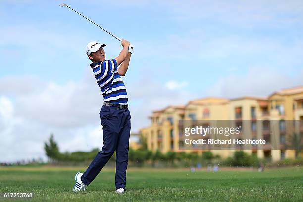 David Lipsky of USA hits his second shot on the 9th hole during day three of the Portugal Masters at Victoria Clube de Golfe on October 22, 2016 in...