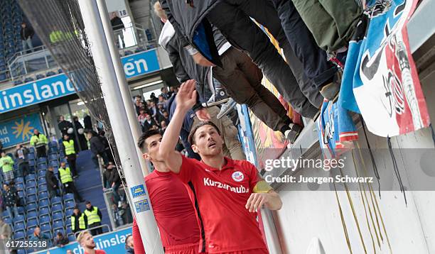 Michael Gardawski of Rostock shakes hands with supporters after the third league match between MSV Duisburg and Hansa Rostock at...