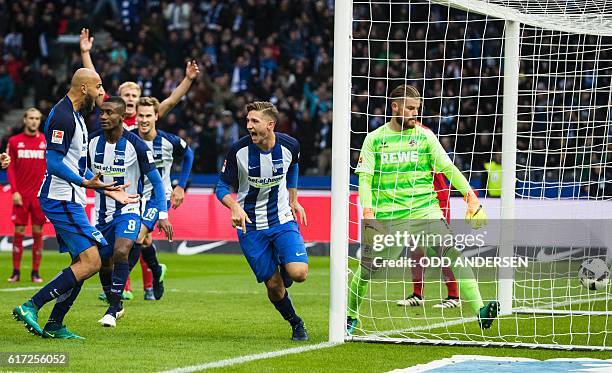 Berlin's defender Niklas Stark celebrates scoring his side's 2nd goal during the German first division Bundesliga football match between Hertha BSC...