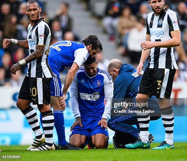 Leon Best of Ipswich Town seeks medical attention after hurting his hand during the Sky Bet Championship Match between Newcastle United and Ipswich...