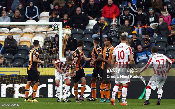 Xherdan Shaqiri of Stoke City scores his team's second goal from a free kick during the Premier League match between Hull City and Stoke City at the...