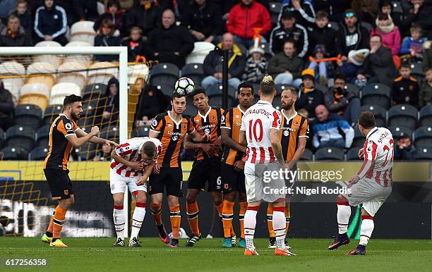 Xherdan Shaqiri of Stoke City scores his team's second goal from a free kick during the Premier League match between Hull City and Stoke City at the...