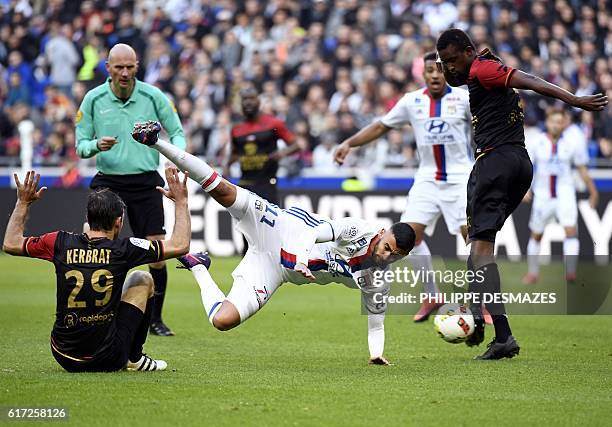 Guingamp's French midfielder Christophe Kerbrat and Guingamp's Senegalese midfielder Moustapha Diallo during the French L1 football match Olympique...