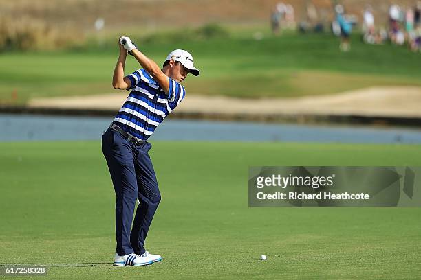 David Lipsky of USA hits his second shot on the 12th hole during day three of the Portugal Masters at Victoria Clube de Golfe on October 22, 2016 in...
