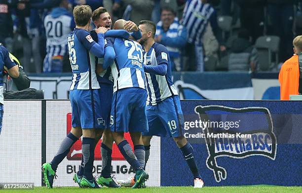 Niklas Stark of Berlin jubilates with team mates after scoring the third goal during the Bundesliga match between Hertha BSC and 1. FC Koeln at...