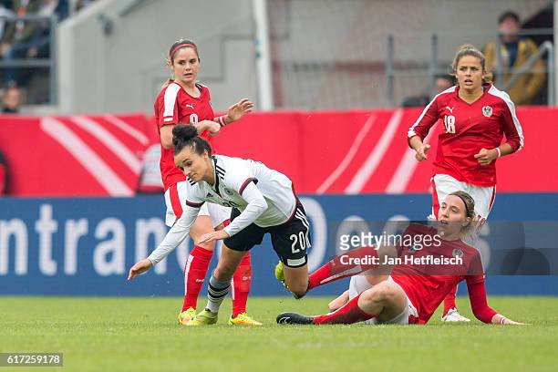 Katharina Schiechtl of Austria battles Lina Magull of Germany during the Women's International Friendly match between Germany and Austria at the...