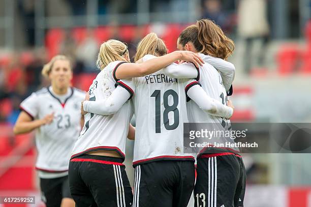 Players of Germany react after scoring a goal during the Women's International Friendly match between Germany and Austria at the Continental Stadium...
