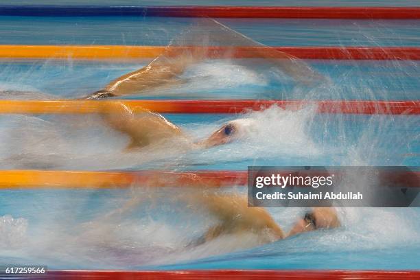 Boglarka Kapas of Hungary, Katinka Hosszu of Hungary and Dong Jie of China compete in the Women's Freestyle 400m Final during the 2016 FINA Swimming...