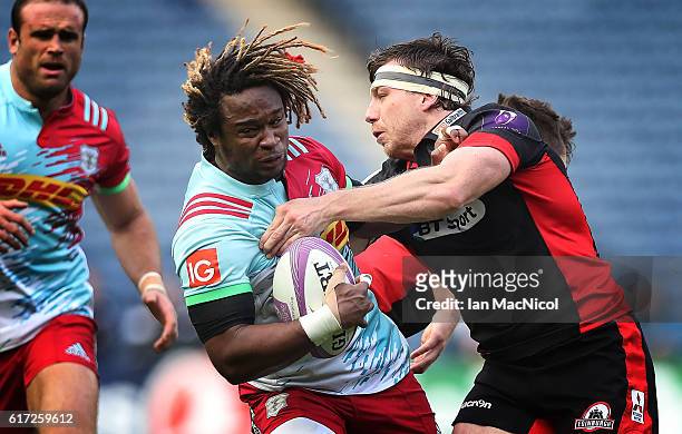 Marland Yarde of Harlequins is tackled by Hamish Watson of Edinburgh during the European Rugby Challenge Cup match between Edinburgh and Harlequins...