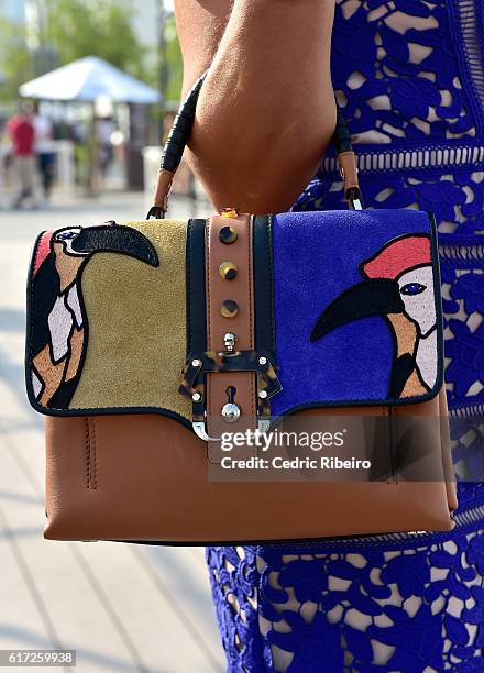 Alanoud Badr, bag detail, attends Fashion Forward Spring/Summer 2017 at the Dubai Design District on October 22, 2016 in Dubai, United Arab Emirates.