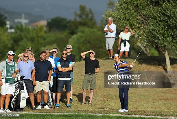David Lipsky of USA hits his second shot on the 15th hole during day three of the Portugal Masters at Victoria Clube de Golfe on October 22, 2016 in...