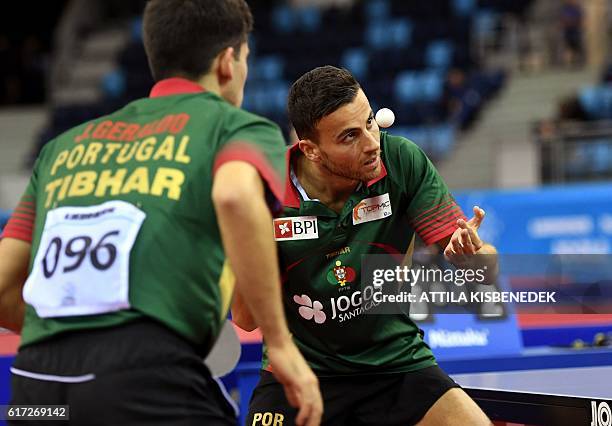 Portuguese Tiago Apolonia and Joao Geraldo vie against Polish Daniel Gorak and Jakub Dyjas in "Tuskecsarnok" sports hall of Budapest on October 22,...