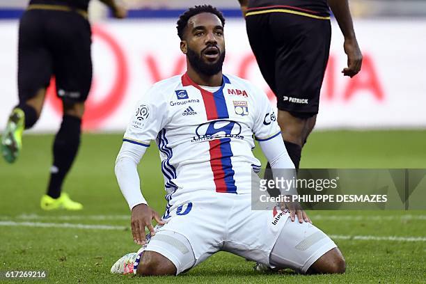 Lyon's French forward Alexandre Lacazette reacts after losing a goal during the French L1 football match between Olympique Lyonnais and EA Guingamp...