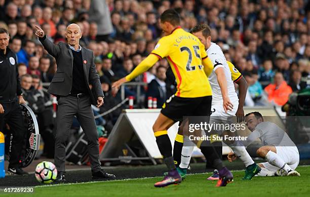 Swansea manager Bob Bradley reacts during the Premier League match between Swansea City and Watford at Liberty Stadium on October 22, 2016 in...