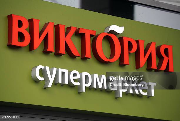 Signage for Victoria supermarket operated by Dixy Group PJSC is displayed outside the company's store in Moscow, Russia, on Friday, Oct. 21, 2016....