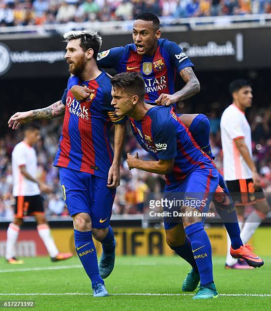 Lionel Messi of FC Barcelona celebrates with his team mates Neymar Jr. And Denis Suarez after scoring his team's third from the penalty spot goal...