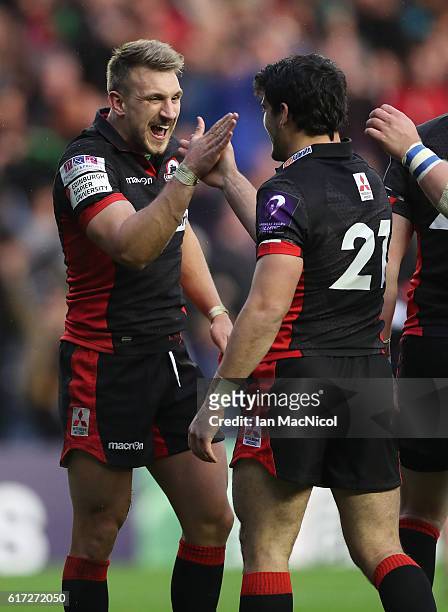Sam Hidalgo-Clyne and Tom Brown of Edinburgh celebrate at full time during the European Rugby Challenge Cup match between Edinburgh and Harlequins at...