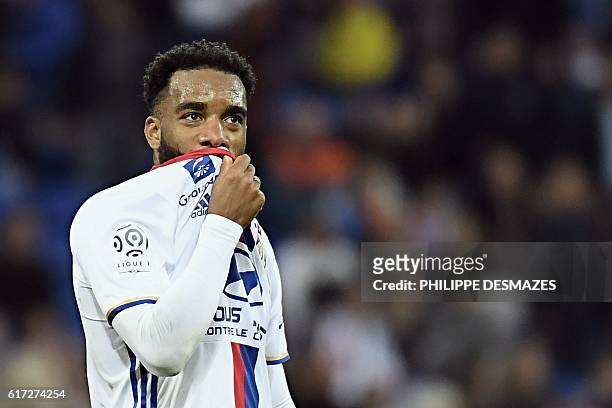 Lyon's French forward Alexandre Lacazette reacts after losing with his team the French L1 football match between Olympique Lyonnais and EA Guingamp...