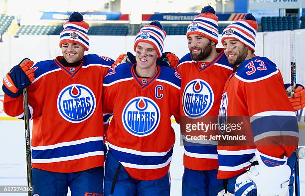 Zack Kassian, Connor McDavid, Patrick Maroon and goaltender Cam Talbot of the Edmonton Oilers pose together after practice for the 2016 Tim Hortons...