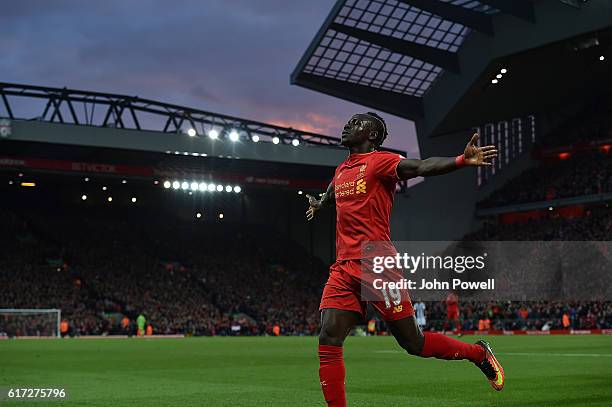 Sadio Mane Scores Liverpools Opener and celebrates during the Premier League match between Liverpool and West Bromwich Albion at Anfield on October...