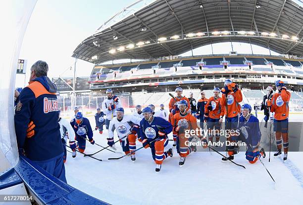 Head coach Todd McLellan of the Edmonton Oilers conducts practice in advance of the 2016 Tim Hortons NHL Heritage Classic at Investors Group Field on...