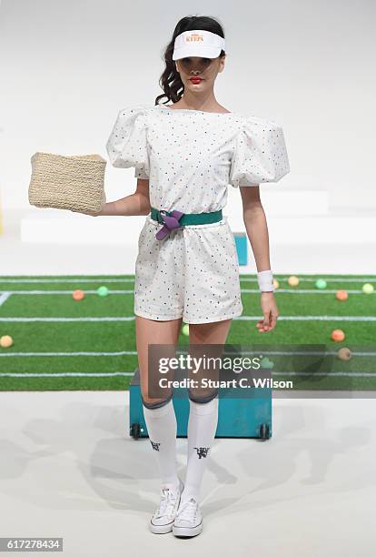 Model walks the runway during the Mrs. Keepa Presentation at Fashion Forward Spring/Summer 2017 held at the Dubai Design District on October 22, 2016...