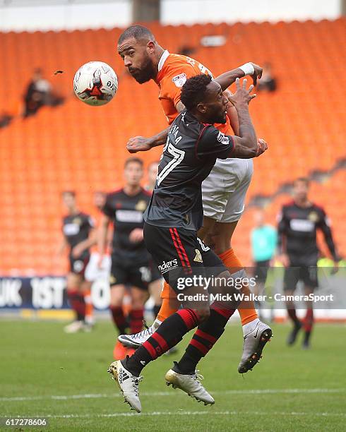 Blackpool's Kyle Vassell battles with Doncaster Rovers' Cedric Evina during the Sky Bet League Two match between Blackpool and Doncaster Rovers at...