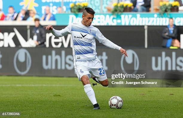 Fabian Schnellhardt of Duisburg passes the ball during the third league match between MSV Duisburg and Hansa Rostock at Schauinsland-Reisen-Arena on...