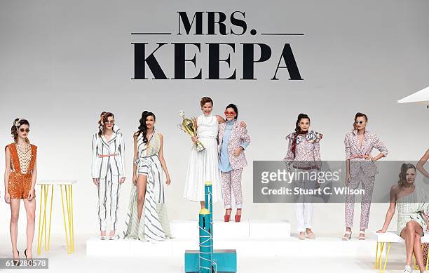 Natalia Shustova and designer Mariam Yehia on the runway during the Mrs. Keepa Presentation at Fashion Forward Spring/Summer 2017 held at the Dubai...