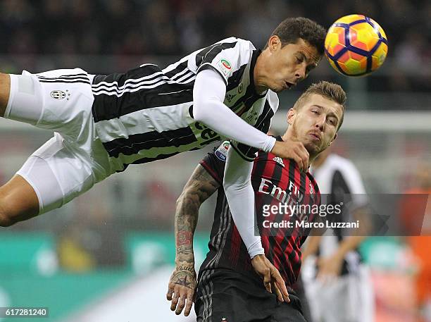 Anderson Hernanes of Juventus FC competes for the ball with Juraj Kucka of AC Milan during the Serie A match between AC Milan and Juventus FC at...
