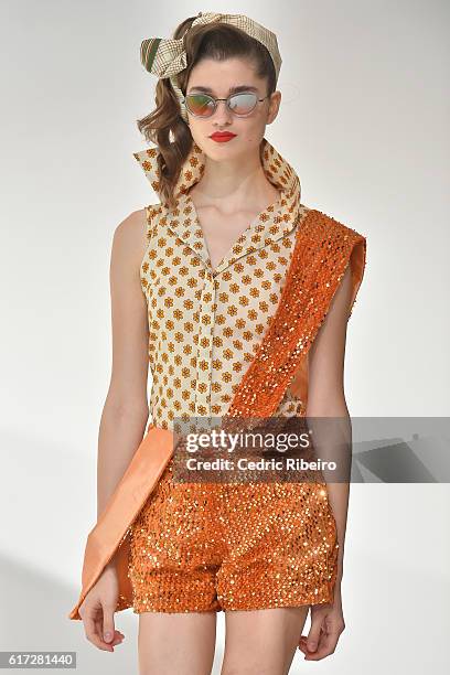 Model walks the runway during the Mrs. Keepa Presentation at Fashion Forward Spring/Summer 2017 held at the Dubai Design District on October 22, 2016...