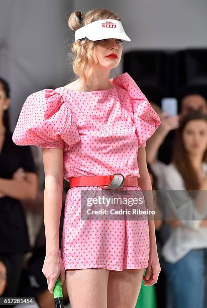 Model walks the runway during the Mrs. Keepa Presentation at Fashion Forward Spring/Summer 2017 held at the Dubai Design District on October 22, 2016...