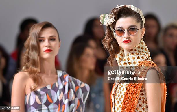 Models walk the runway during the Mrs. Keepa Presentation at Fashion Forward Spring/Summer 2017 held at the Dubai Design District on October 22, 2016...