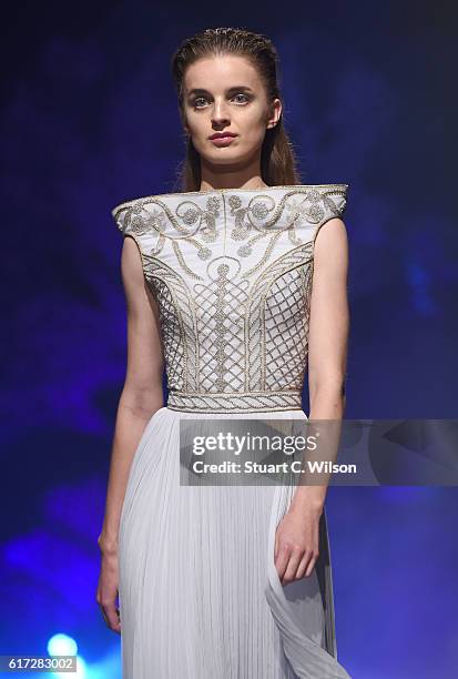 Model walks the runway during the Zareena show at Fashion Forward Spring/Summer 2017 held at the Dubai Design District on October 22, 2016 in Dubai,...