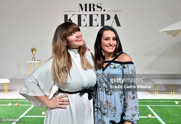 Guests pose at the runway during the Mrs. Keepa Presentation at Fashion Forward Spring/Summer 2017 held at the Dubai Design District on October 22,...