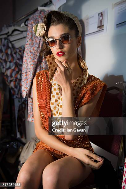 Model backstage ahead of the Mrs. Keepa presentation during Fashion Forward Spring/Summer 2017 at the Dubai Design District on October 22, 2016 in...