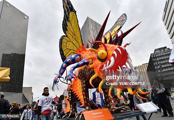 View of "Alebrijes" -Mexican folk art traditional sculptures representing fantastical creatures - during the tenth Monumental "Alebrijes" Parade and...