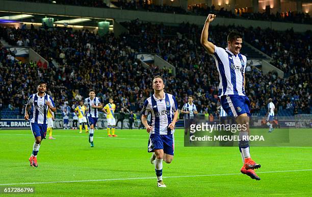 Porto's midfielder Andre Silva celebrates after scoring a goal during the Portuguese league football match FC Porto vs FC Arouca at the Dragao...