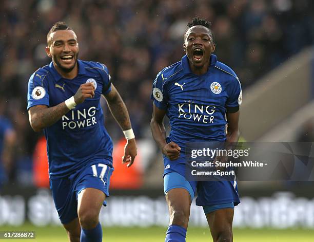 Leicester City's Ahmed Musa celebrates scoring the opening goal with team-mate Danny Simpson during the Premier League match between Leicester City...