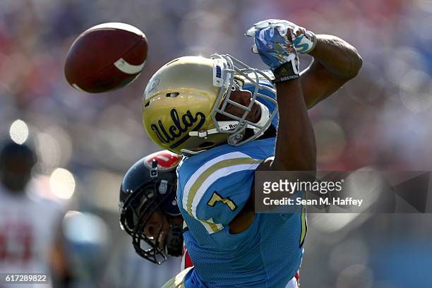Brian Allen of the Utah Utes breaks up a pass intended for Darren Andrews of the UCLA Bruins during the first half of a game at the Rose Bowl on...