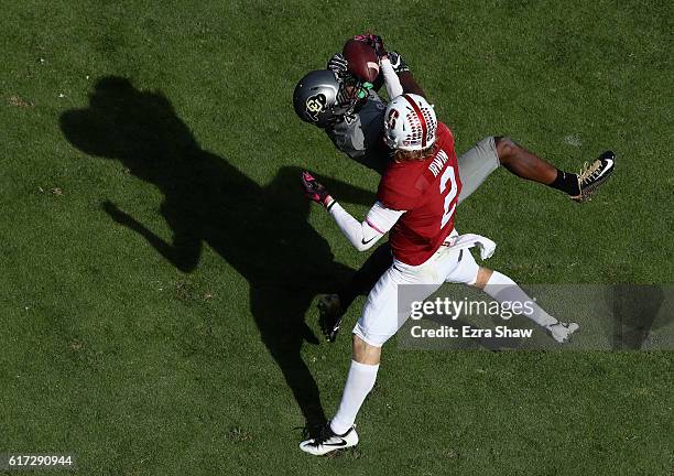 Chidobe Awuzie of the Colorado Buffaloes breaks up a pass intended for Trenton Irwin of the Stanford Cardinal at Stanford Stadium on October 22, 2016...