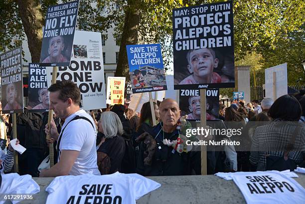 People participate in the Rally for Aleppo outside Downing Street on October 22, 2016 in London, England. The protest was held in support of, as well...